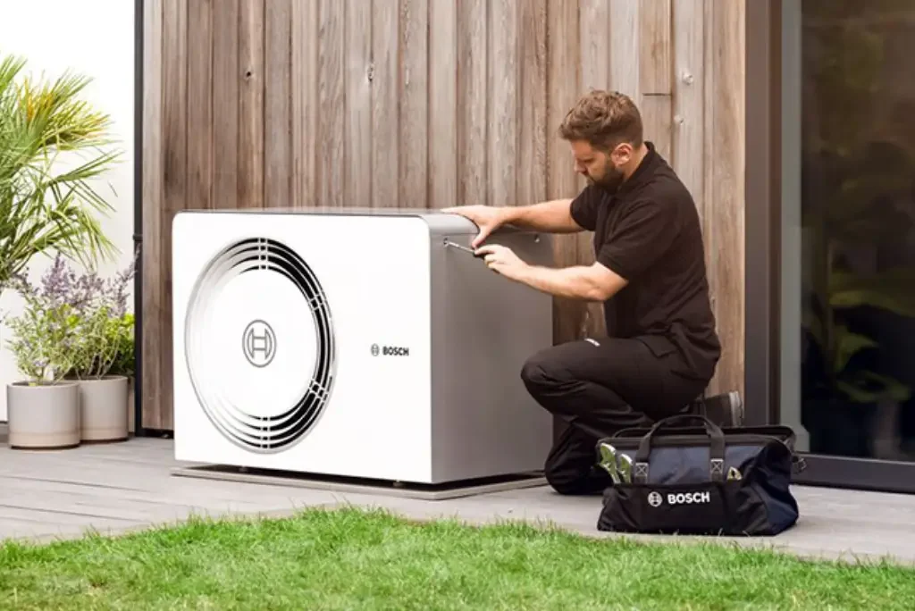 Air Source Heat Pump being installed by Engineer